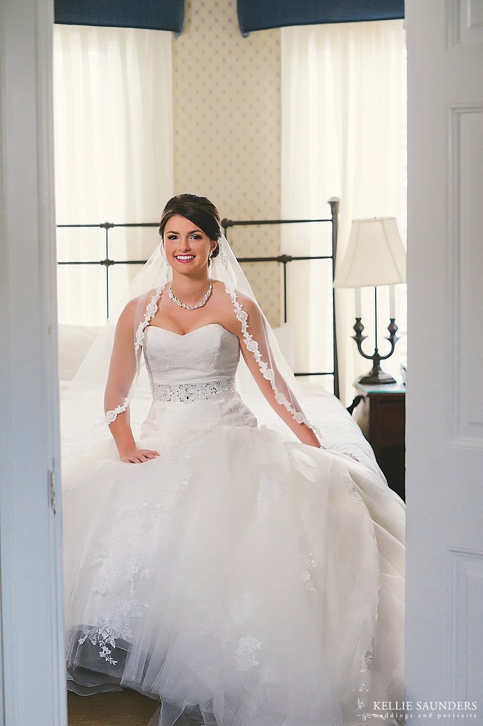 bride photographed through doorway